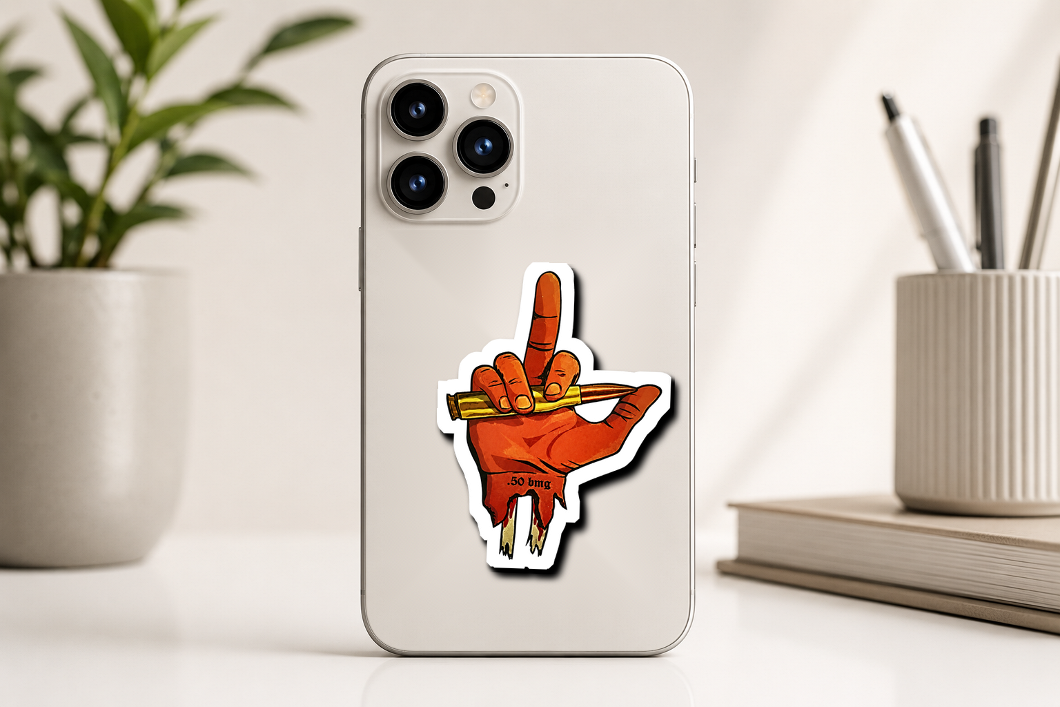Bullet Hand Graphic Premium Vinyl Sticker applied on phone mockup by Pridway Skins